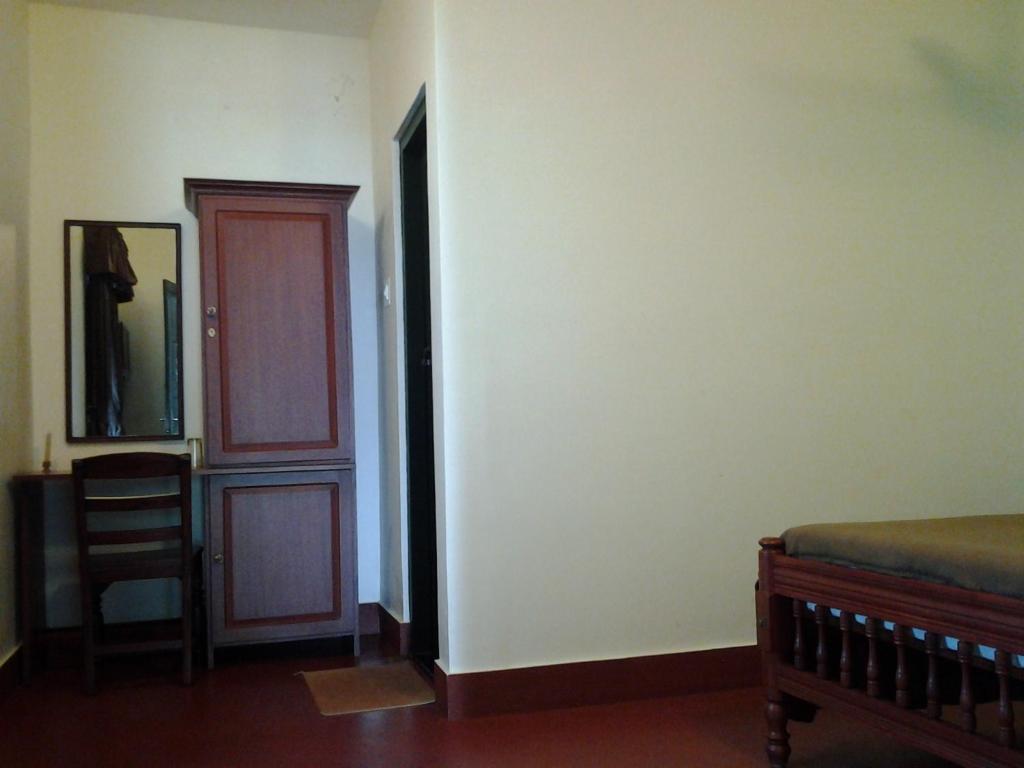 לינה וארוחת בוקר Kochi Elphinstone Residency חדר תמונה